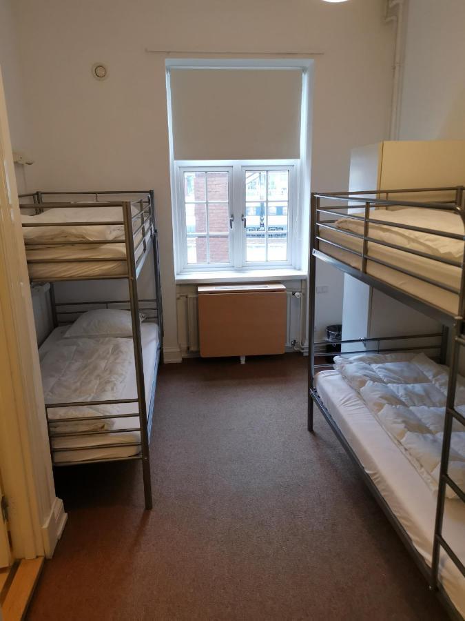 Danhostel Odense City Экстерьер фото A typical hostel room