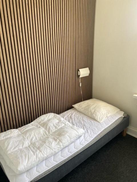 Danhostel Odense City Экстерьер фото A bed with a duvet