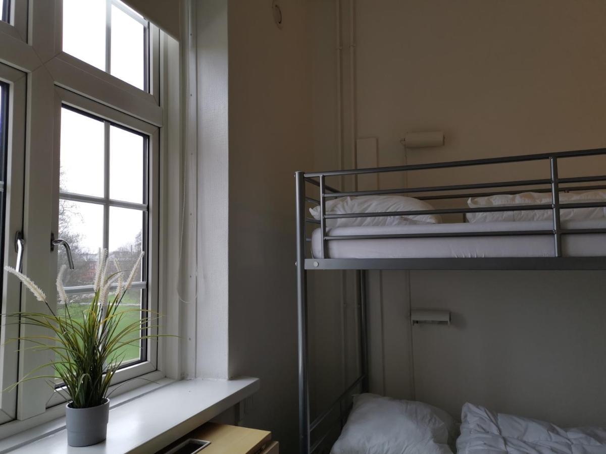 Danhostel Odense City Экстерьер фото A room at the hostel